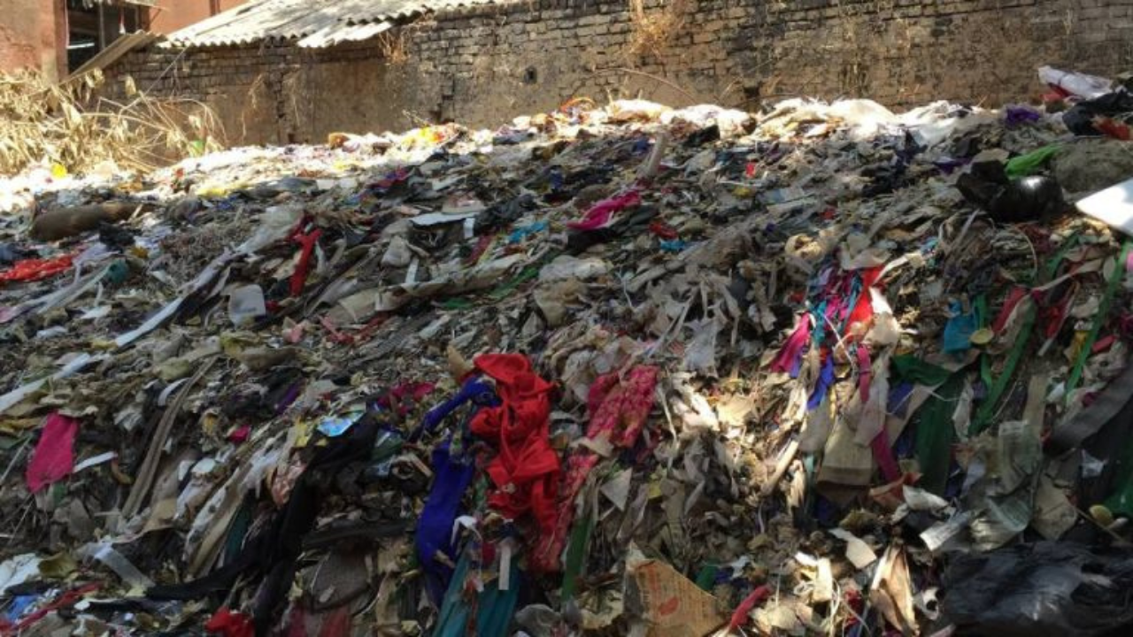 Community women sorting and categorising collected garments in Earth5R livelihood programme