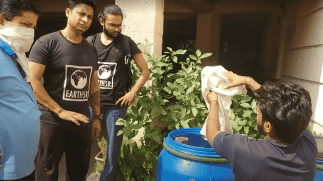 Residents participate in a hands on session to learn composting of organic waste