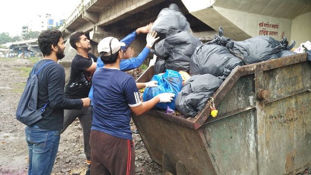 CSR and ESG initiative by an NGO promoting sustainable waste management practices in Mumbai, India, focusing on reducing plastic waste