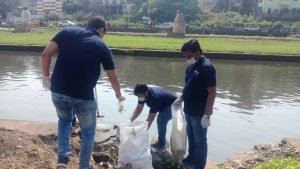 Waste collection at Mula Mutha riverbank