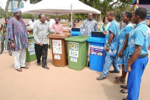 Local community members participating in a waste segregation drive using color-coded recycling bins, highlighting Earth5R’s circular economy initiatives that promote Waste Management, Sustainability, ESG, and CSR practices as a leading NGO in Mumbai.