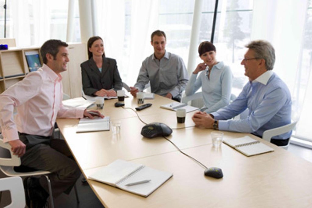 Corporate and NGO representatives in a sustainability meeting in Mumbai discussing waste management, ESG goals, and CSR partnerships led by Earth5R.