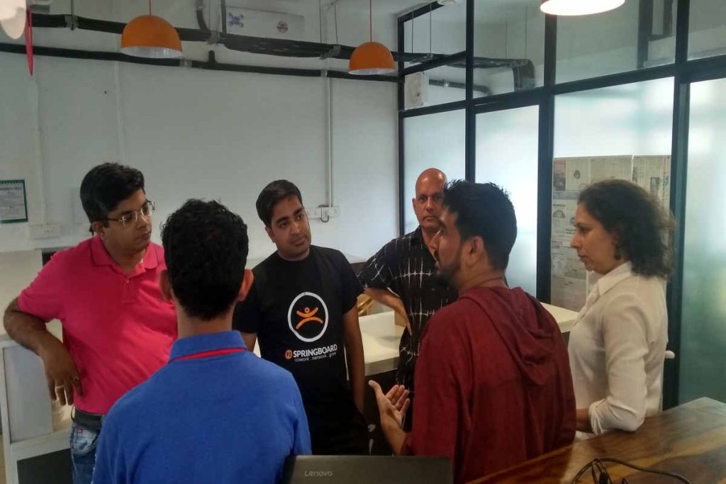 Earth5R team members and sustainability experts engaged in a collaborative discussion on Waste Management, Sustainability, ESG, and CSR initiatives at the Mumbai office, focusing on community-led environmental projects.