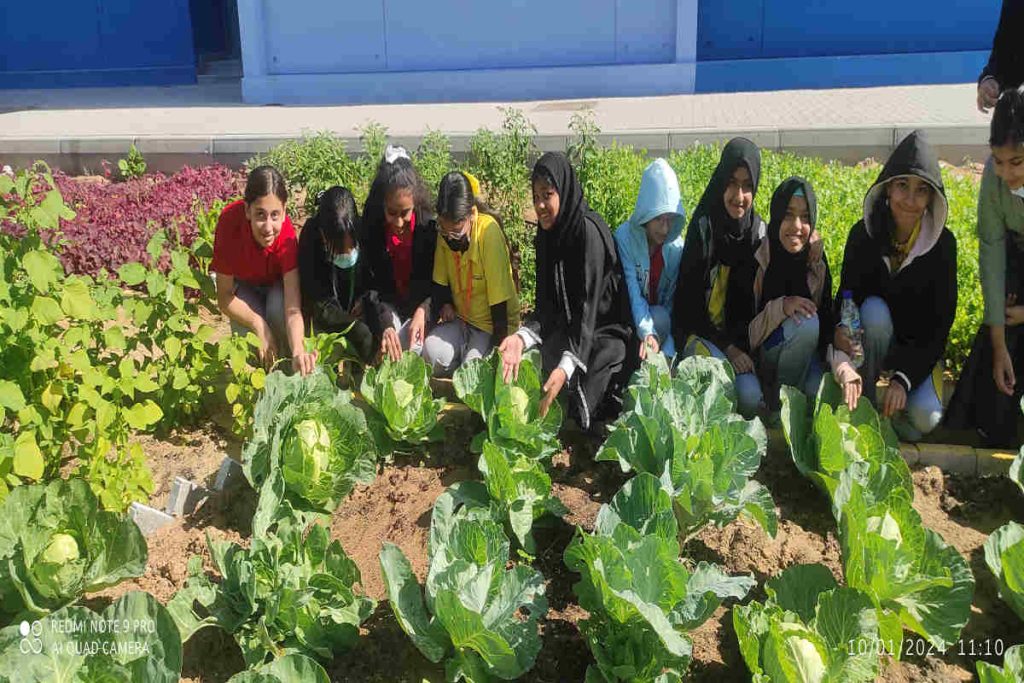 Students participating in an Earth5R sustainability program, learning organic gardening and waste-free food cultivation as part of ESG and CSR education initiatives in Mumbai.