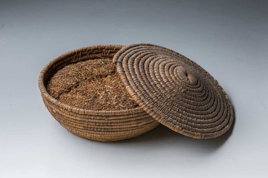 Traditional woven basket filled with natural compost, symbolising Earth5R’s sustainable waste management and circular economy practices promoted through ESG and CSR programs in India