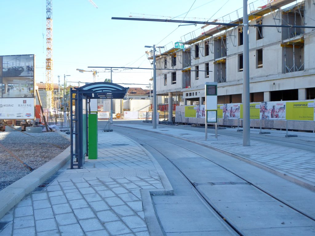 A newly built tram stop surrounded by construction work, representing sustainable urban infrastructure development linked to ESG, CSR, and environmental planning efforts promoted by NGOs such as Earth5R in Mumbai.