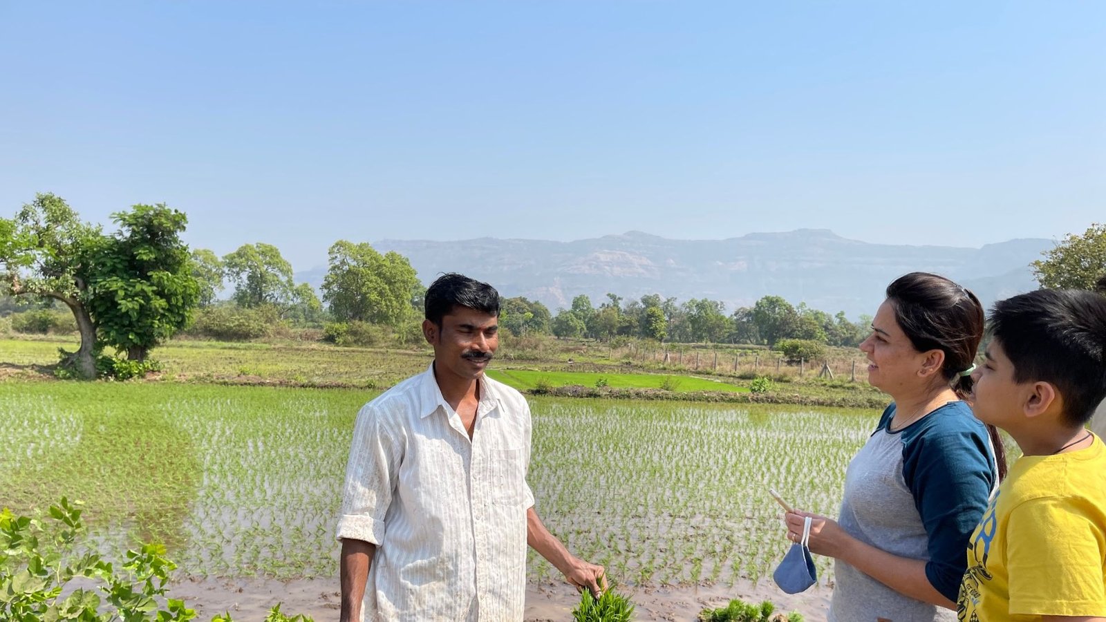 Indian farmers learning renewable energy solar pump installation as part of Earth5R sustainable agriculture CSR programme