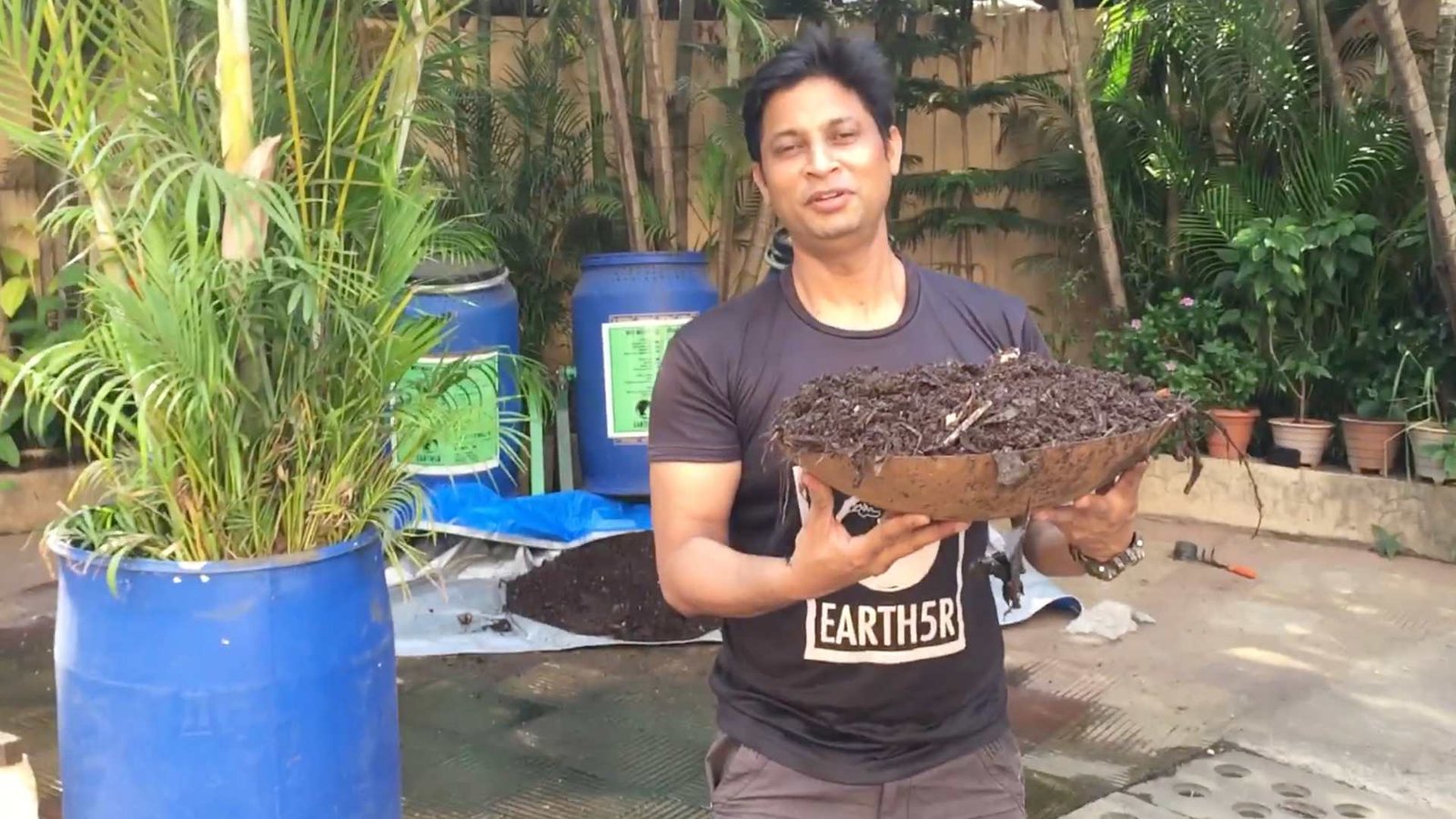 Saurabh Gupta Environmentalist and Founder of Earth5R with heap of compost produced through Earth5R decentralised waste management system in a Mumbai residential building