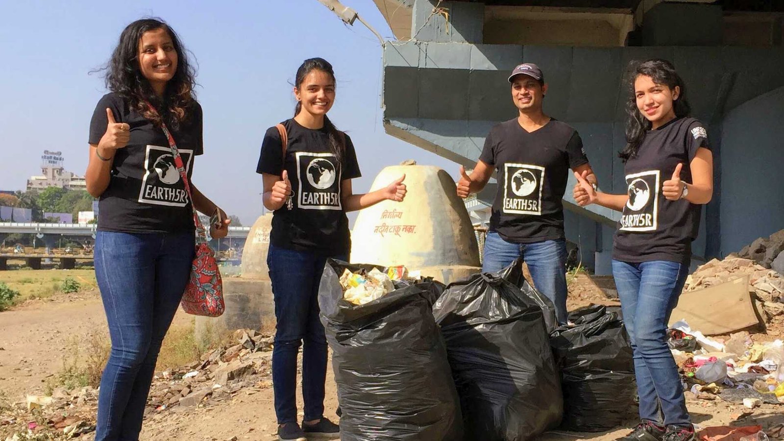 Community members working with Earth5R on large-scale recycling operations