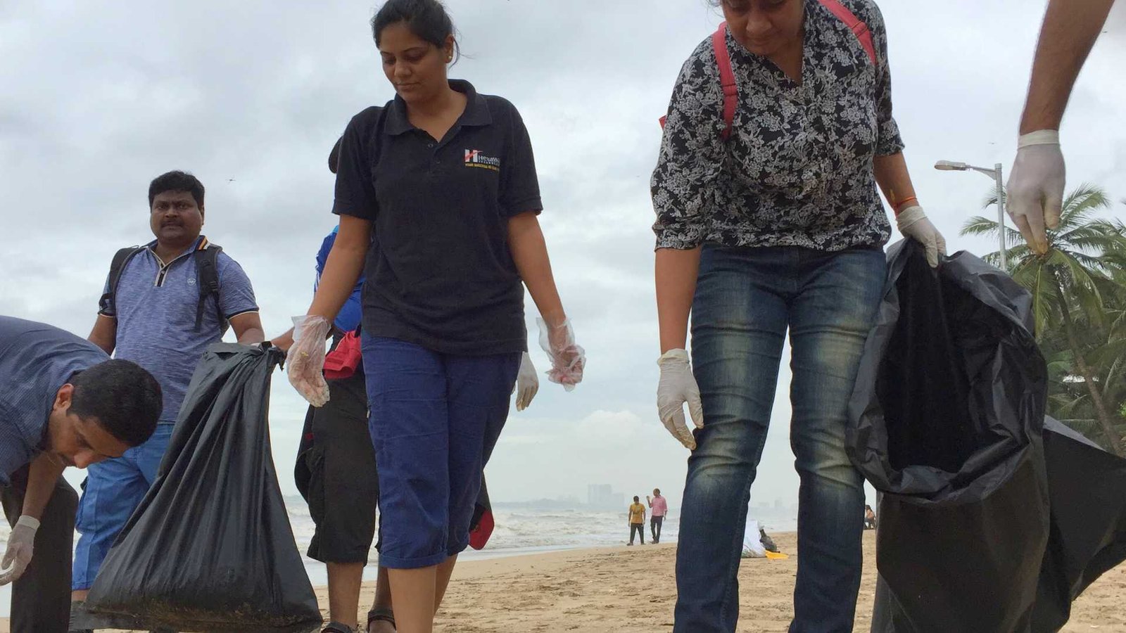 Earth5R team members during field-level waste collection and environmental cleanup