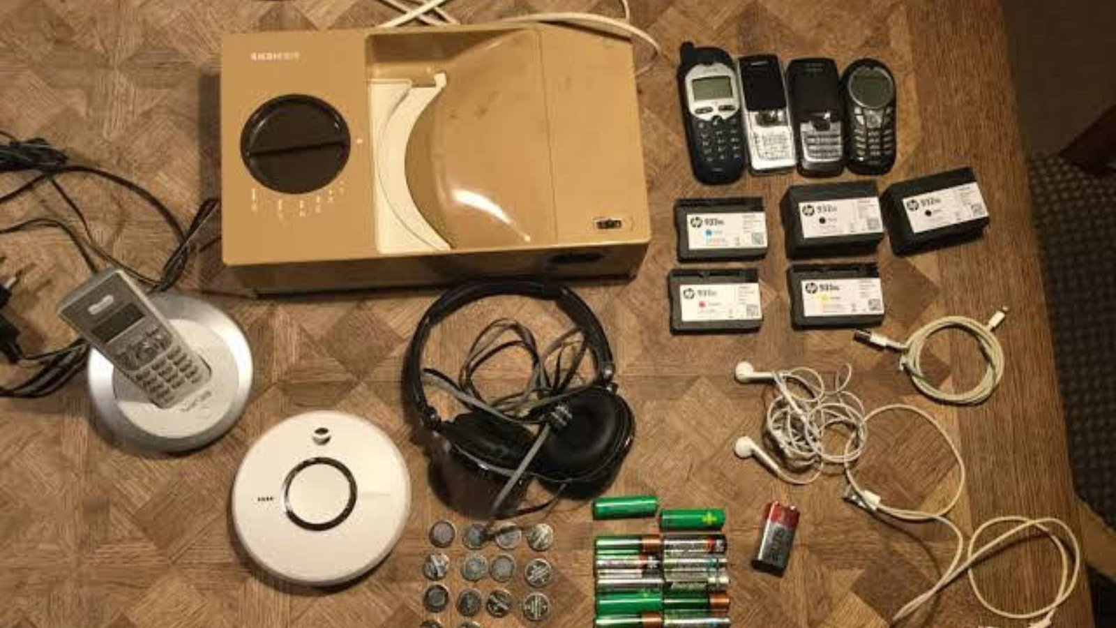 Electronic waste sorting and categorisation by Earth5R team separating phones laptops batteries cables for certified recycling