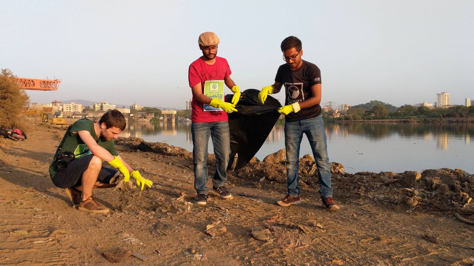 Earth5R team conducting cleanup at Mithi river Mumbai