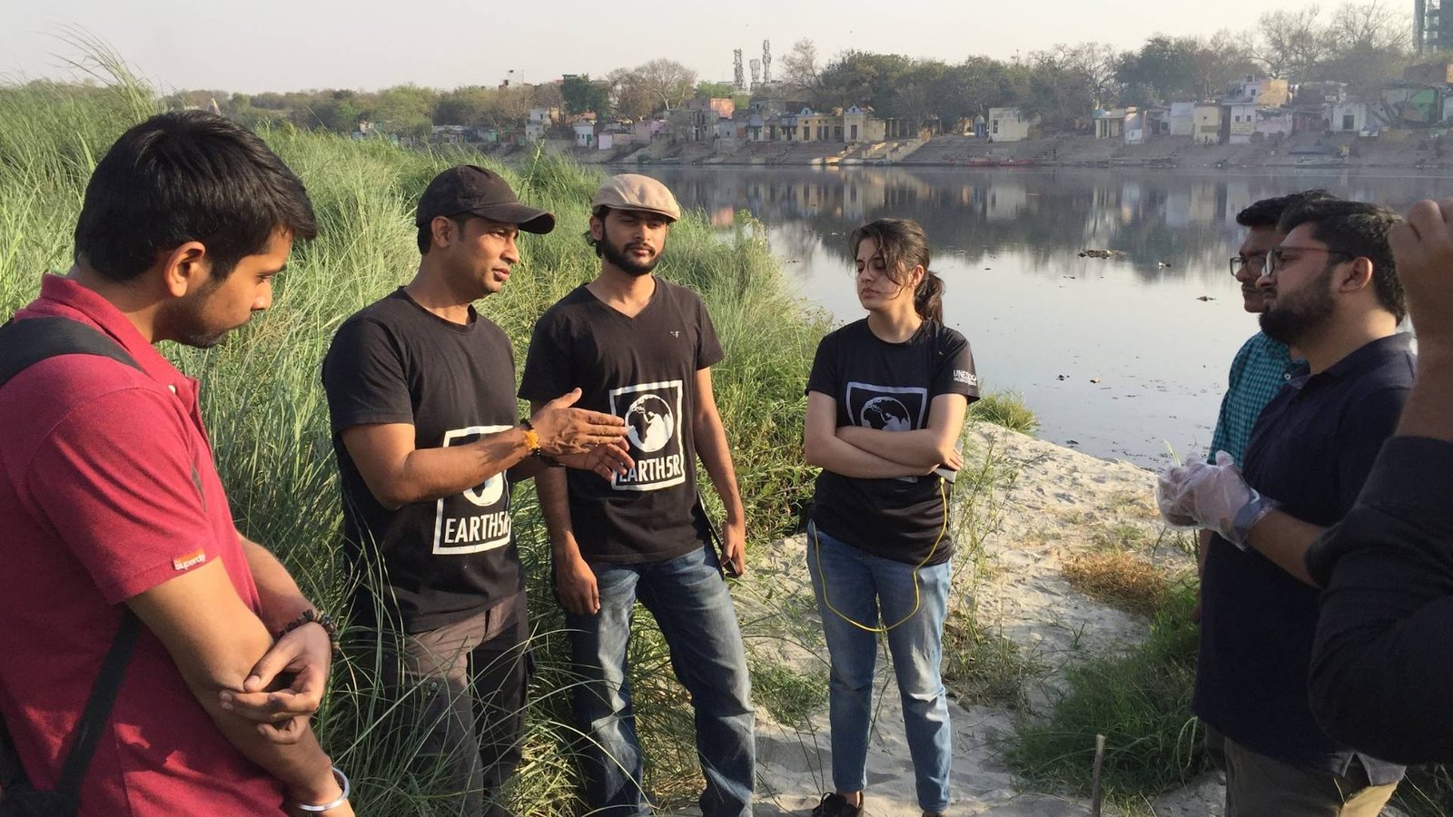 Earth5R team members analyzing waste collected from the Yamuna river in New Delhi