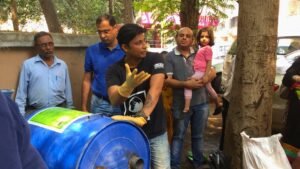 Saurabh-Gupta-founder-Earth5R-training-citizens-on-waste-segregation-and-composting-demonstration