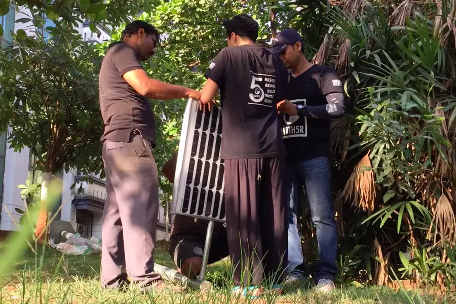 Earth5R team installing a solar street light for Hexaware's SolarOne CSR project in Navi Mumbai
