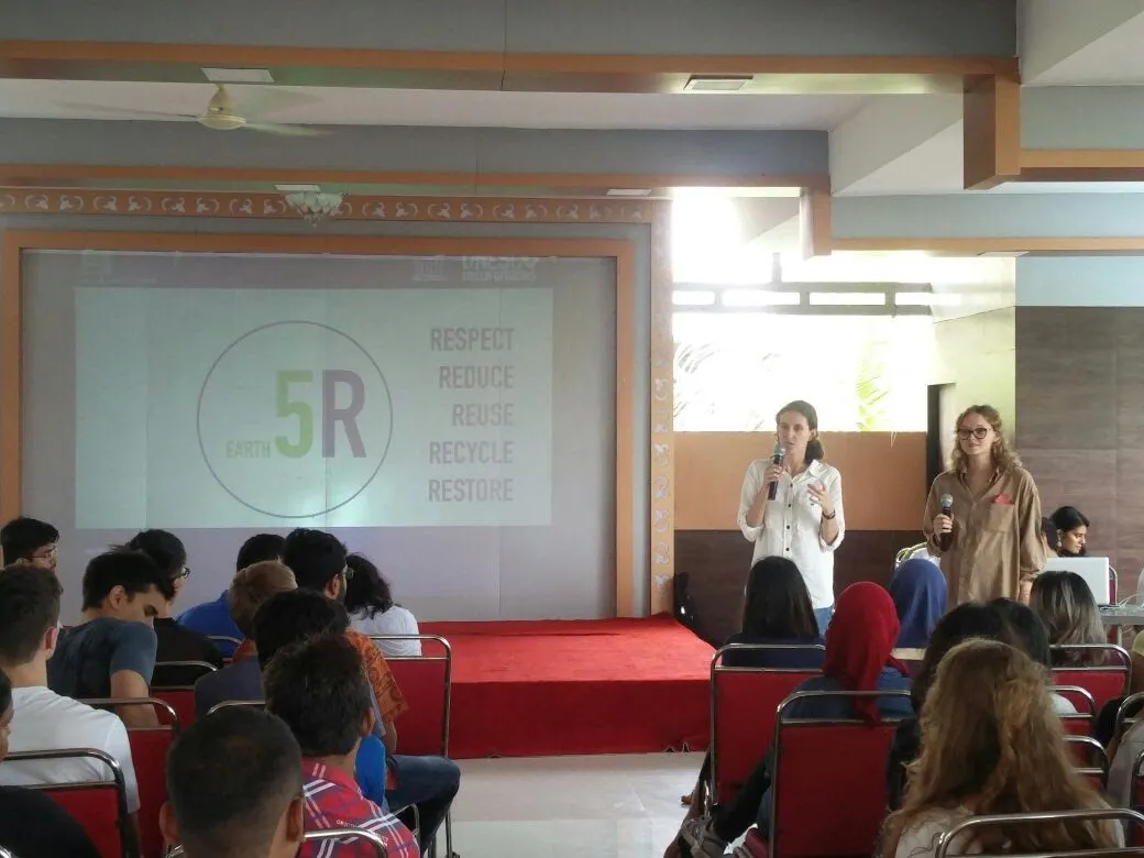 Earth5R speakers presenting the Earth5R 5R framework (Respect, Reduce, Reuse, Recycle, Restore) to students