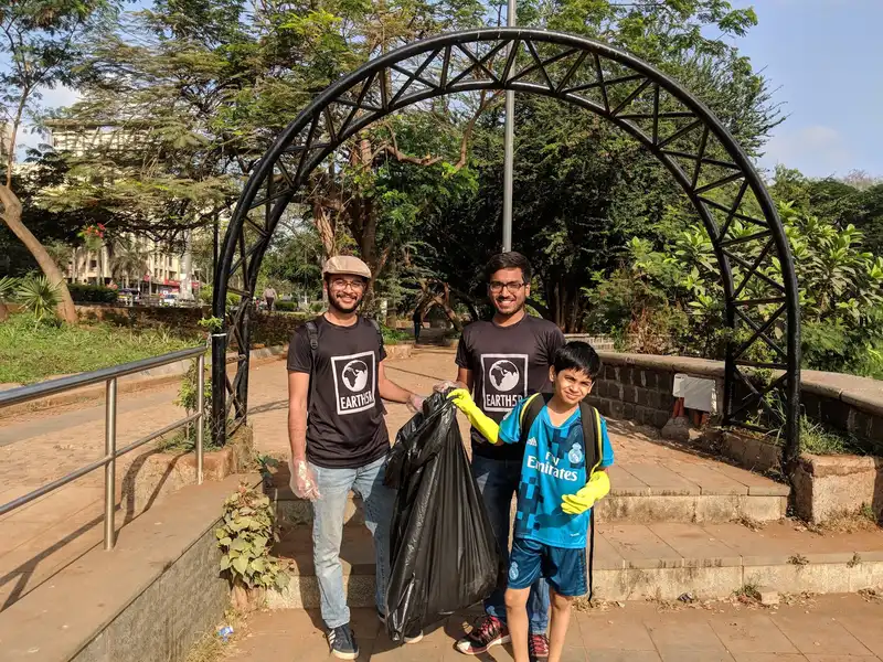 Jahaan Gupta, founder of the I Am Earth project, with a bag of waste collected at Powai Lake, Mumbai