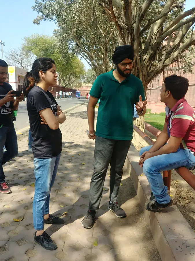 Earth5R volunteers speaking with citizens about circular economy near the Red Fort in Delhi