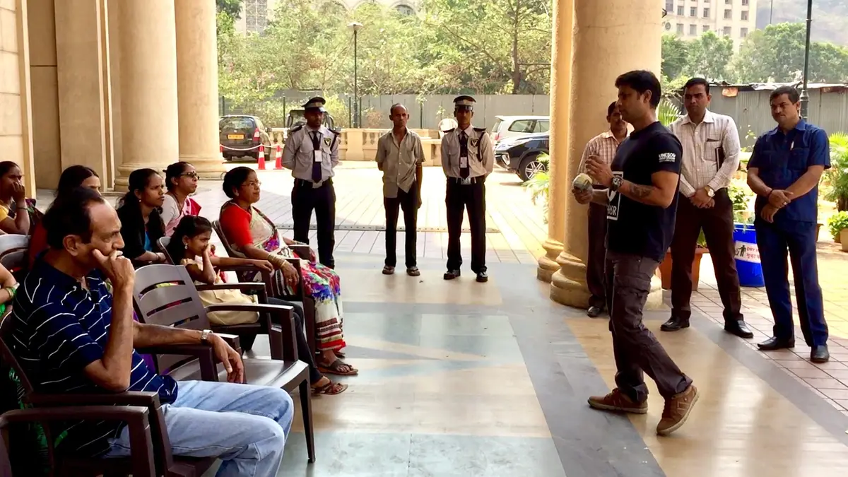 Saurabh Gupta training residents and building staff on segregation in a Powai residential lobby, Earth5R CSR programme