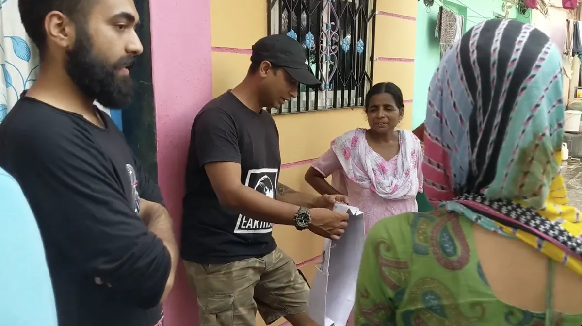 Earth5R team explaining the rooftop plantation and buyback programme to women in an informal settlement in Mumbai