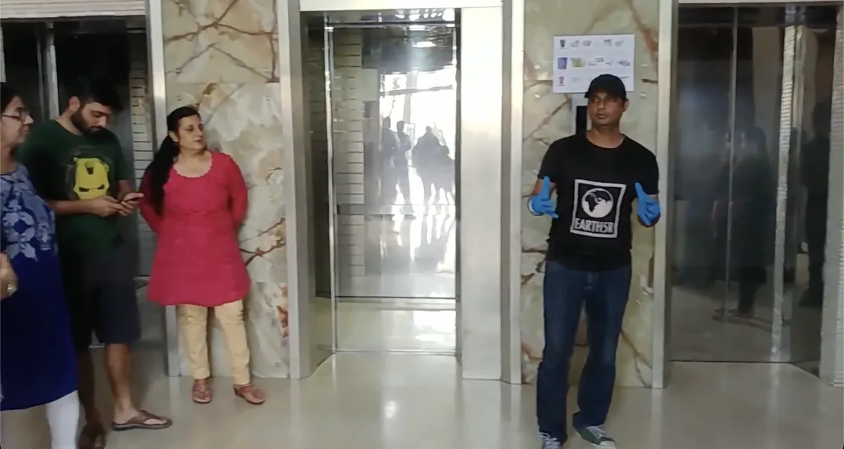 Saurabh Gupta of Earth5R training residents on waste segregation in a residential building lobby