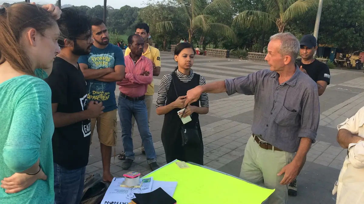High school urban planning internship field work. Citizens sharing climate solution ideas at an Earth5R street hackathon in Mumbai