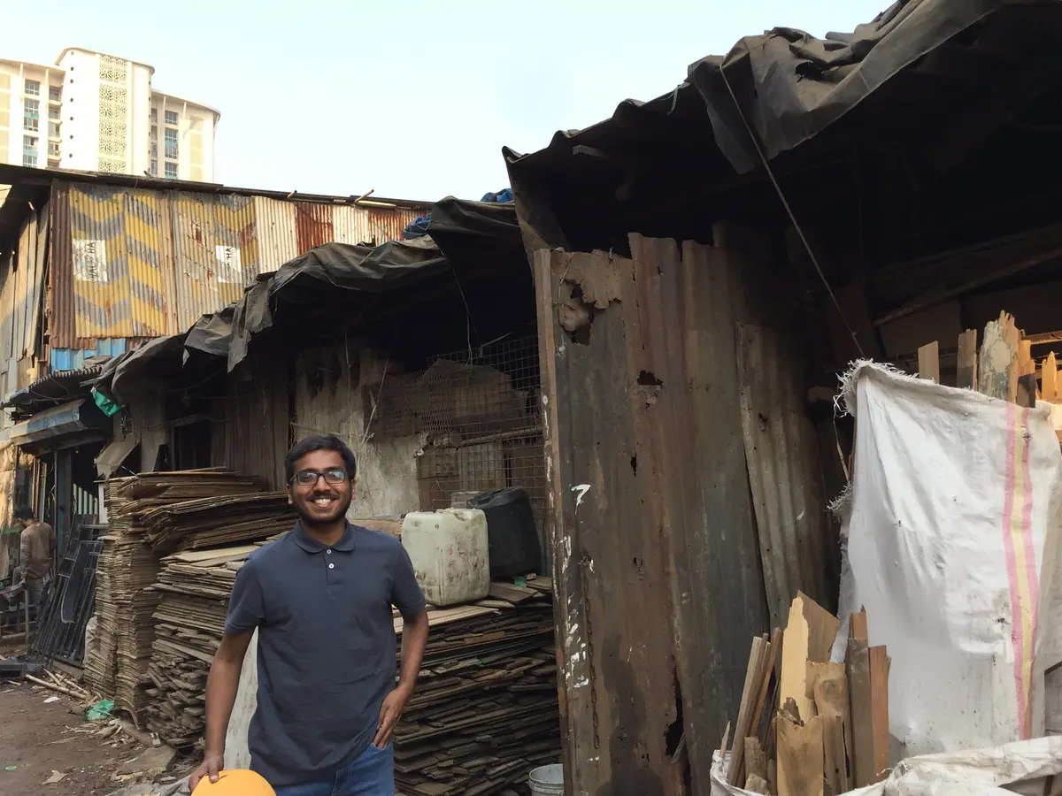 Earth5R volunteer at a local recycler scrap shop, part of connecting buildings with recyclers in Mumbai